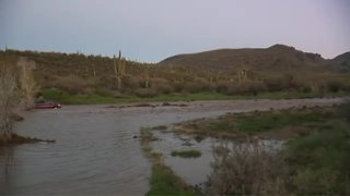 Three people rescued from van in running wash near Cave Creek