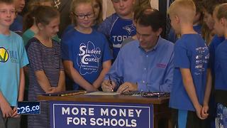 Walker signs state budget