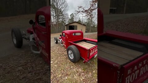 EHR: Lil' Red Shop Truck Sits Patriotically By the Flag. As American as Apple Pie.