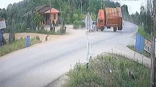 Truck loses control and ends up on top of motorcyclist