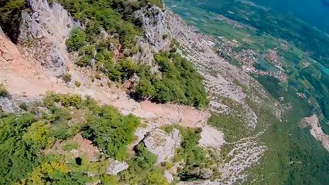 Extreme wingsuit proximity flight over Italian Alps