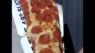 LIFE-SIZE PIZZA! Dodgers and White Sox selling 18-inch pizza slice at Spring Training - ABC15 Digital