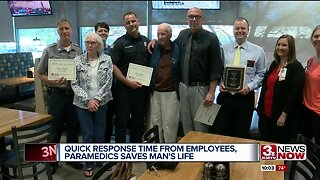 Hy-Vee employees honored for possibly saving man's life