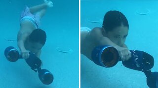 Kid Has A Blast Playing With Cool Underwater Scooter