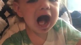 Baby argues that cold yogurt is hot