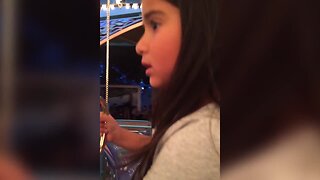 Little Girl doesn't Like the Carousel