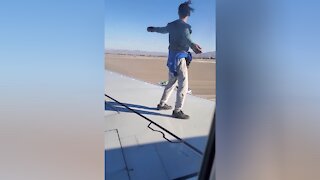 Police identify man accused of climbing on airplane in Las Vegas