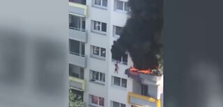 Children jump from window to escape fire