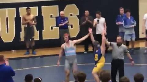 High-school wrestler with Down syndrome at district tournament