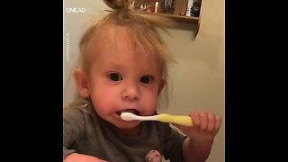 Kid Pretends Her Toothbrush Is Electric