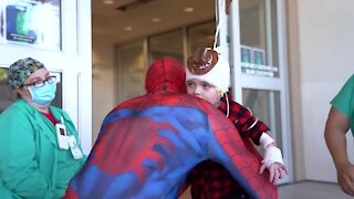 3-year-old burn victim gets visit from Spiderman as he is released from hospital