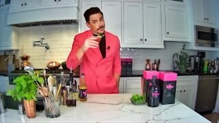 Celebrity mixologist with a cocktail recipe using T-Mobile 5Gin