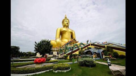 Temple and rice field coffee shop Wat Muang in Ang Thong province in Thailand