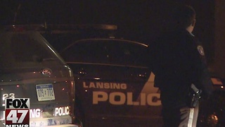 Armed robber on the run in Lansing