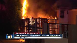 Fire rips through garage at City Heights home