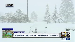 More than a foot of snow reported in the high country