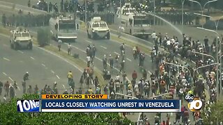 Locals closely watching unrest in Venezuela