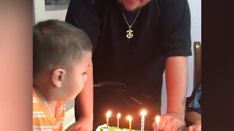 A Tot Boy Spits On The Cake Instead Of Blowing Out The Candles