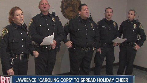 Lawrence "Caroling Cops" spread holiday cheer