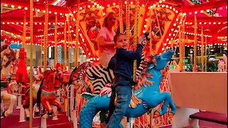 Carousel Ride: Noah Rides Carousel With Nana