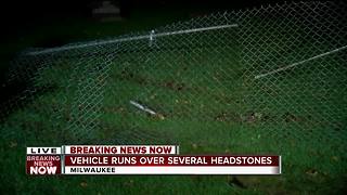 Car crashes into cemetery on Milwaukee's northwest side