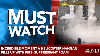 Incredible moment a helicopter hangar fills up with fire- suppressant foam