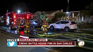 Crews battle house fire in San Carlos