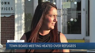 'I am embarrassed to be an Amherst resident' Town board meeting turns heated over asylum seekers