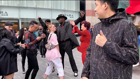 There's street performance show in Bullring city centre in Birmingham