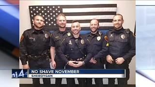 Police officers participate in No Shave November