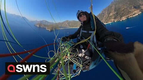 French paraglider rescued at sea after plummeting into FREEFALL due to chute malfunction