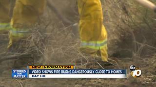 Fire burns dangerously close to homes in Bay Ho
