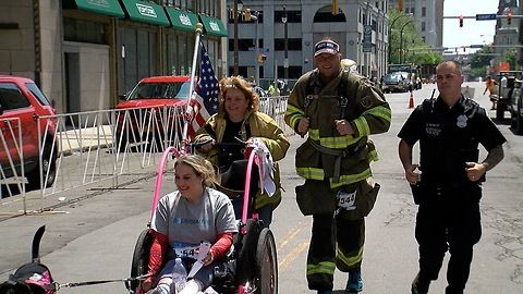 Lousiana firefighter runs Buffalo Marathon to honor local cancer patient