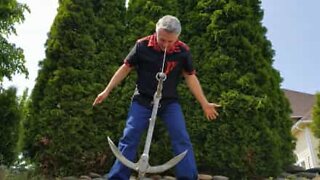 Bizarre: Man puts hook in nose and swings anchor!