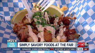 Allison Gargaro tries lobster fries at the fair