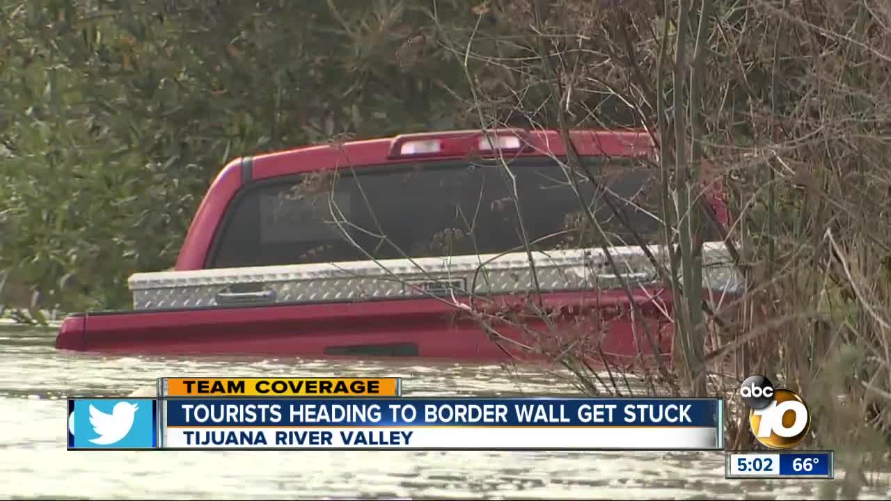 Tourists heading to border wall get stuck in flood