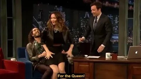 Russell Brand is told off by a US talk show host after suggestively bouncing an uncomfortable Katha