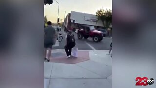 CAUGHT ON VIDEO: Jeep startles a crowd of protestors