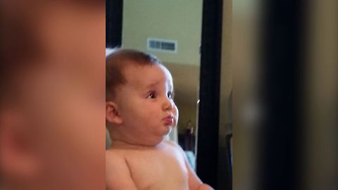 Baby Entertains Family By Making Grandpa Faces