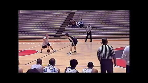 Ankle Breaker Dribble Move In College Basketball Game: Defender Bites Hard