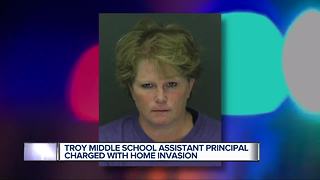 Troy middle school assistant principal arrested for home invasion