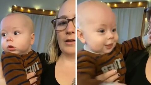 Baby gets adorably startled when mom suddenly starts speaking