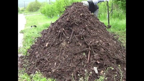 Overturning/Mixing the compost in pile on May Day (P9.2)