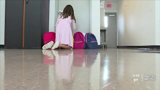 11-year-old girl collecting backpacks for homeless children