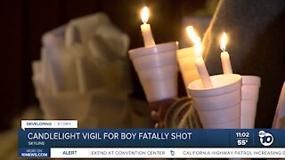 Family and friends hold vigil for boy hsot and killed in Skyline
