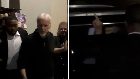 James Cameron gives fans the middle finger after they boo him for not signing autographs