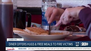 Diner offers hugs & free meals to fire victims