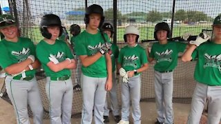 North Boulder Little League baseball team returns home