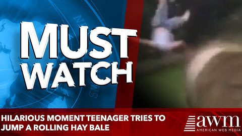 Hilarious moment teenager tries to jump a rolling hay bale