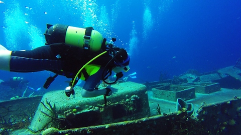Young divers explore historical wreck in Bay of Pigs